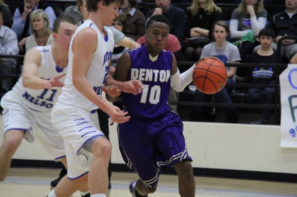 DHS dribbles past Byron Nelson