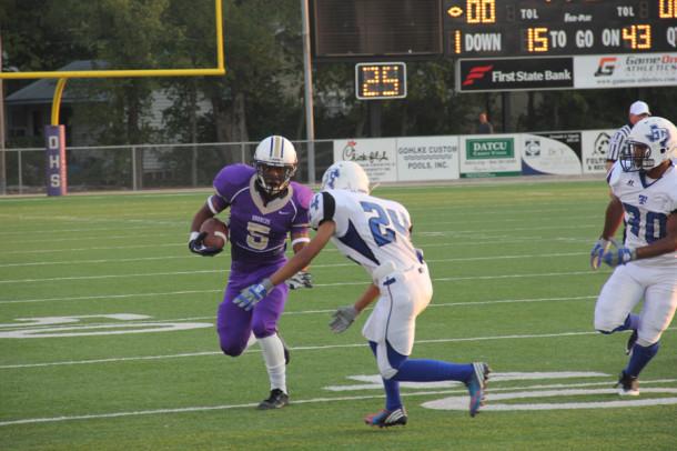 Xavier Scott tries to get by a R.L. Turner defender during the teams home game on Sept. 7. The Broncos won the game 51-18 to improve to 1-1 on the season.