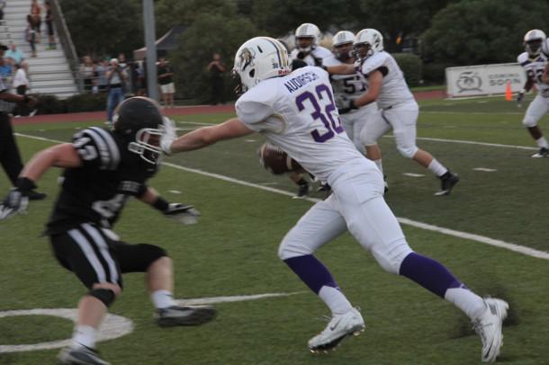 During a game earlier this season Jacob Audrisch pushes an opposing player out of the way. The Broncos rolled past White Settlement Brewer on Friday.