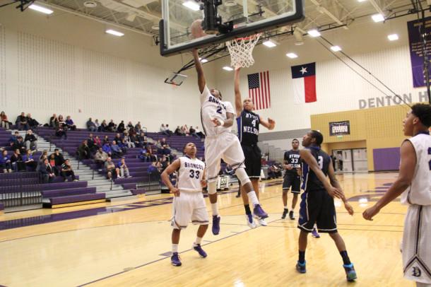 Adarian Harris goes up for a lay up in the teams season finale against Byron Nelson. The Broncos who were leading by nine in the last three minutes came up just short.