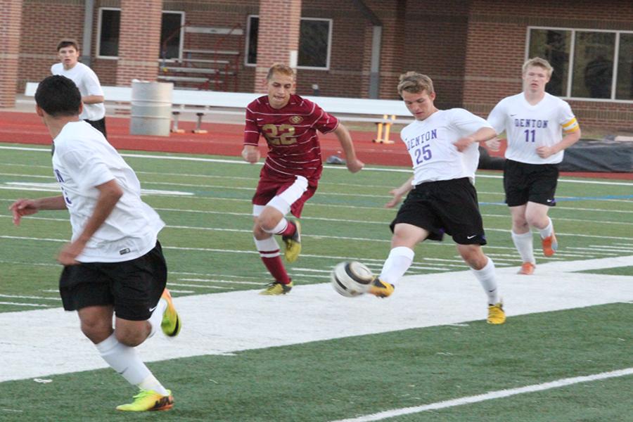 During the playoff game with Saginaw Wesley Kohler dribbles up the field. The Broncos won the game 2-0 and advanced to the area round against Wichita Falls Hirschi on Thursday.