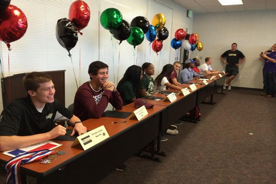 Nine Bronco athletes from spring sports sign to colleges. The event was coordinated by the Denton High Counselors.